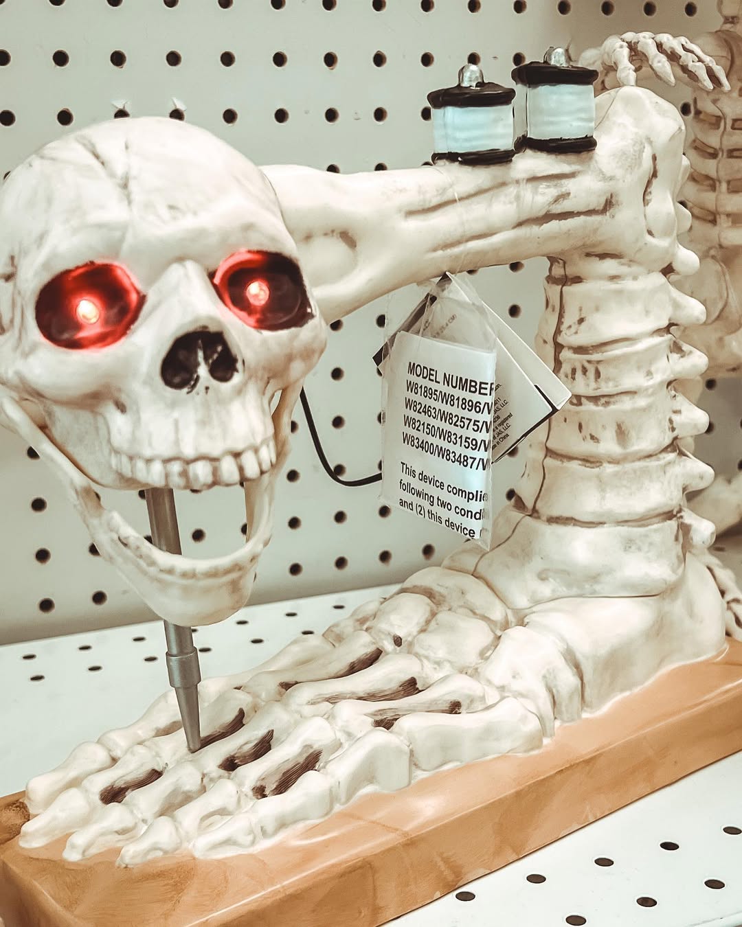 photo of a fake skeleton sewing machine decoration from joann's