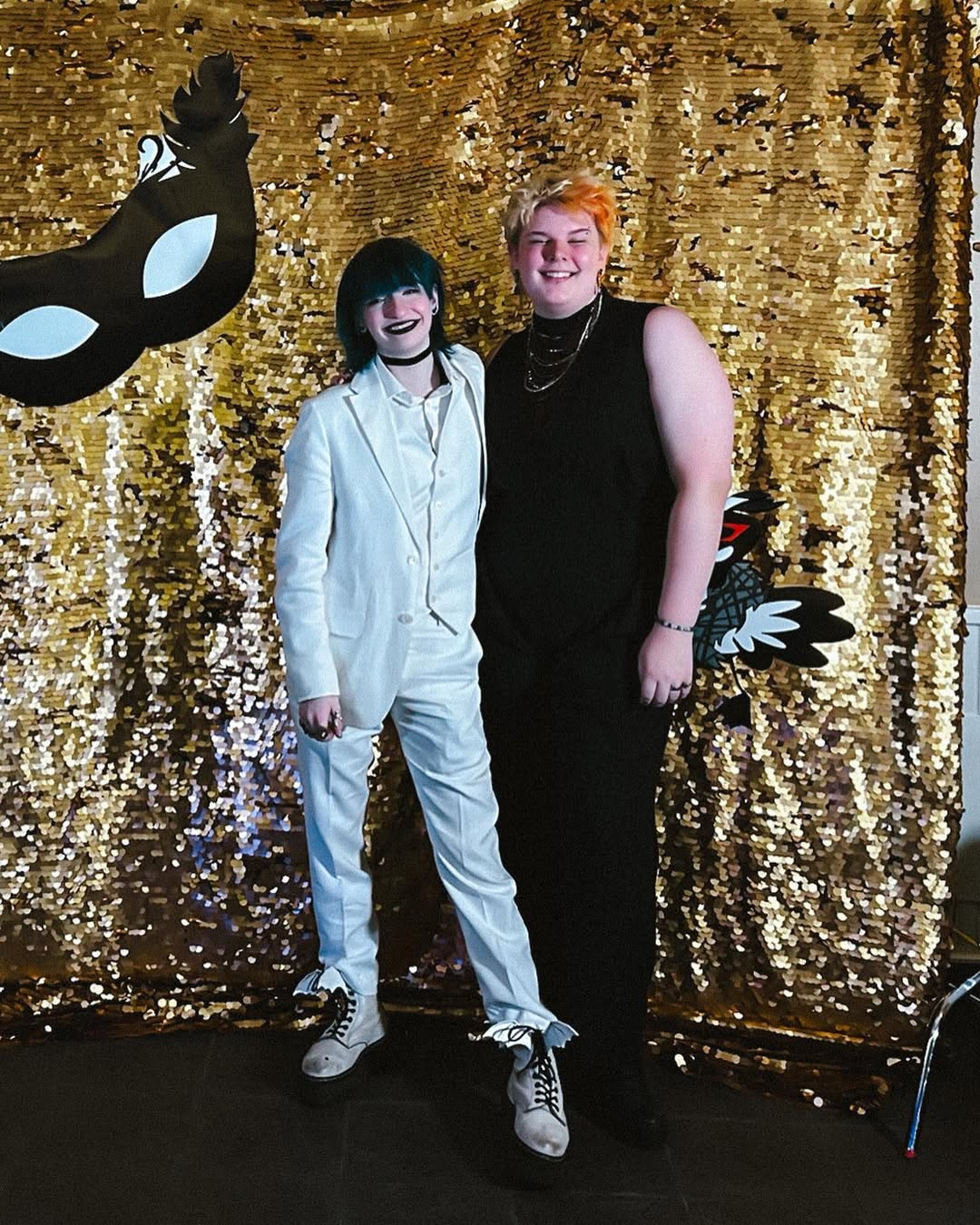 photo of amara and cal in front of the gala backdrop